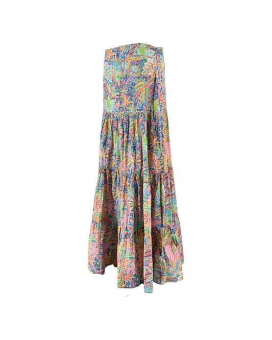 A strapless tiered maxi dress with a vibrant multicolor tropical floral print, displayed on a plain white background.