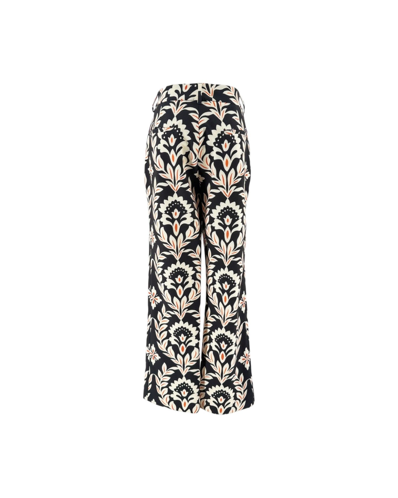 Black wide-leg trousers with a beige and white damask floral pattern, shown against a plain white background.