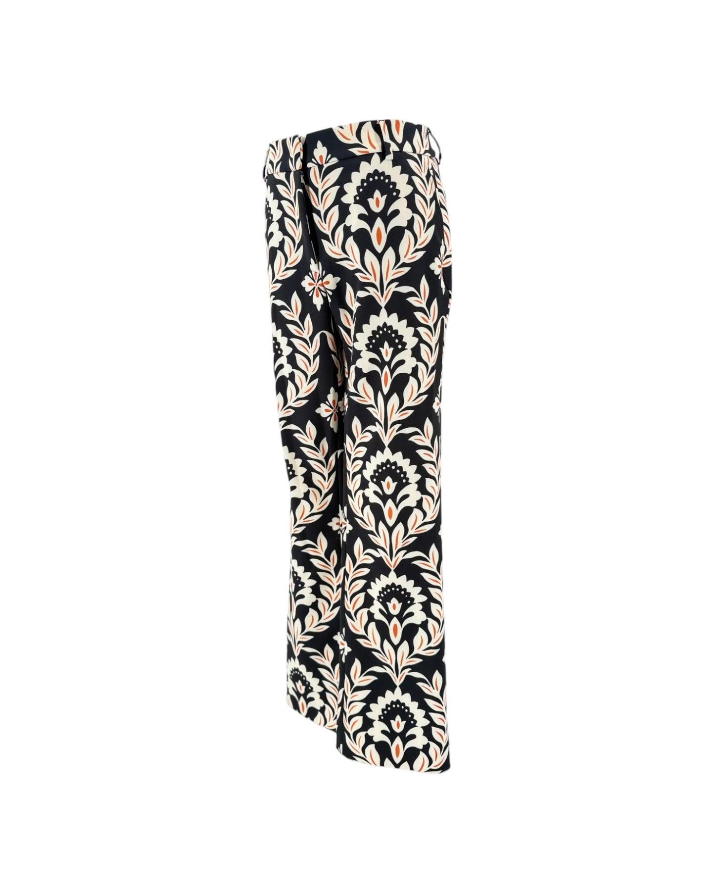 A pair of wide-leg trousers featuring a black base with a beige and white damask floral pattern, shown against a plain white background.