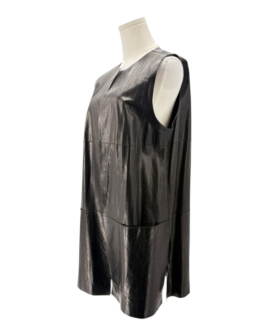 Black leather dress on a mannequin against a white background