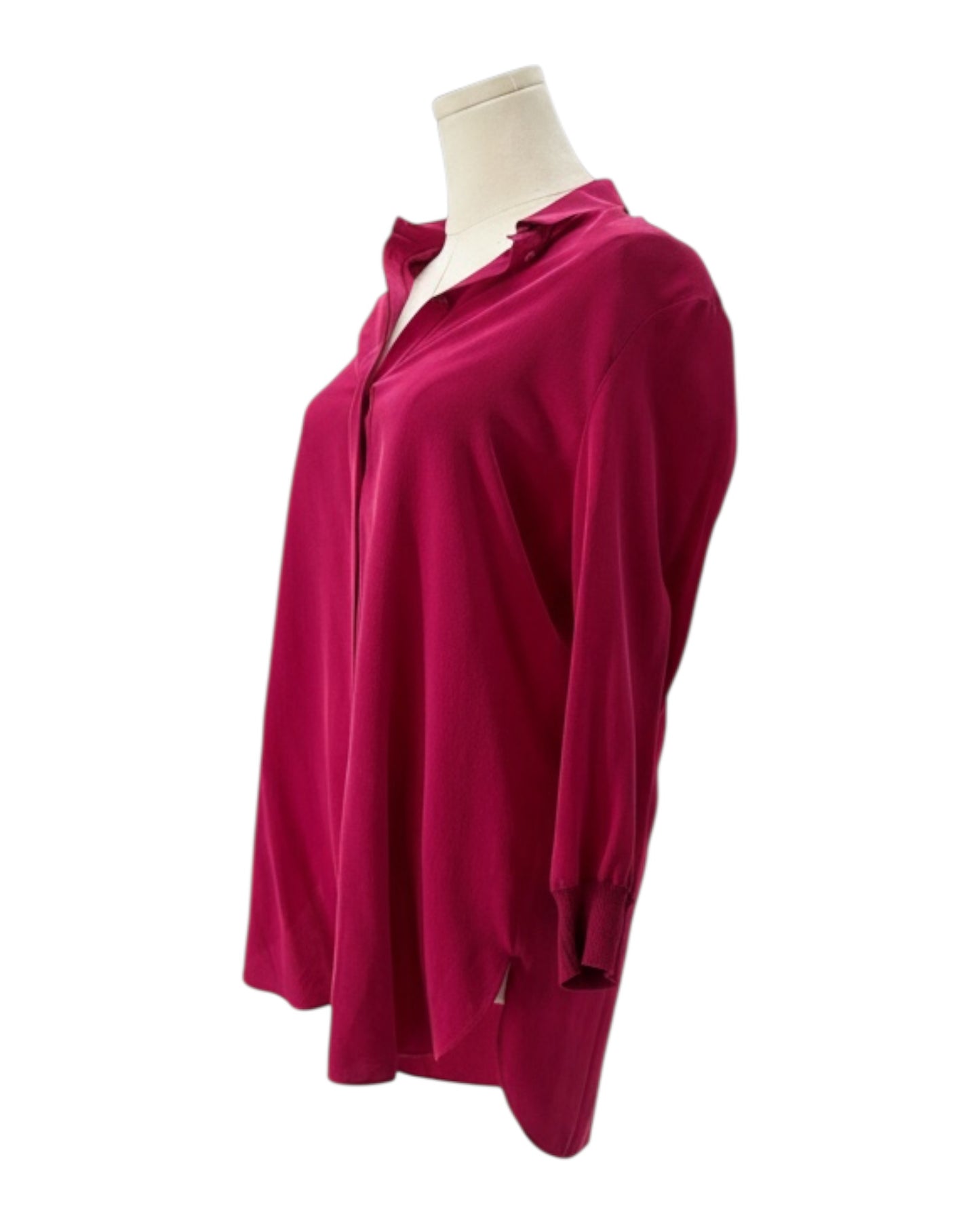 Pink blouse on a mannequin against a white background