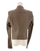 Brown jacket on a mannequin against a white background