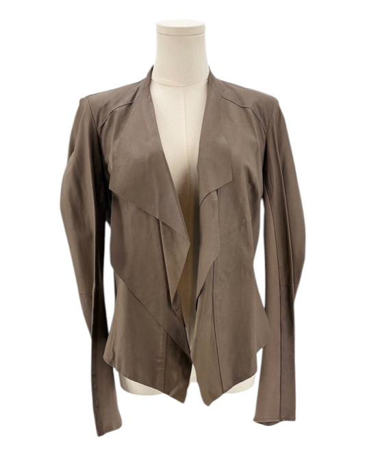 Brown jacket on a mannequin against a white background