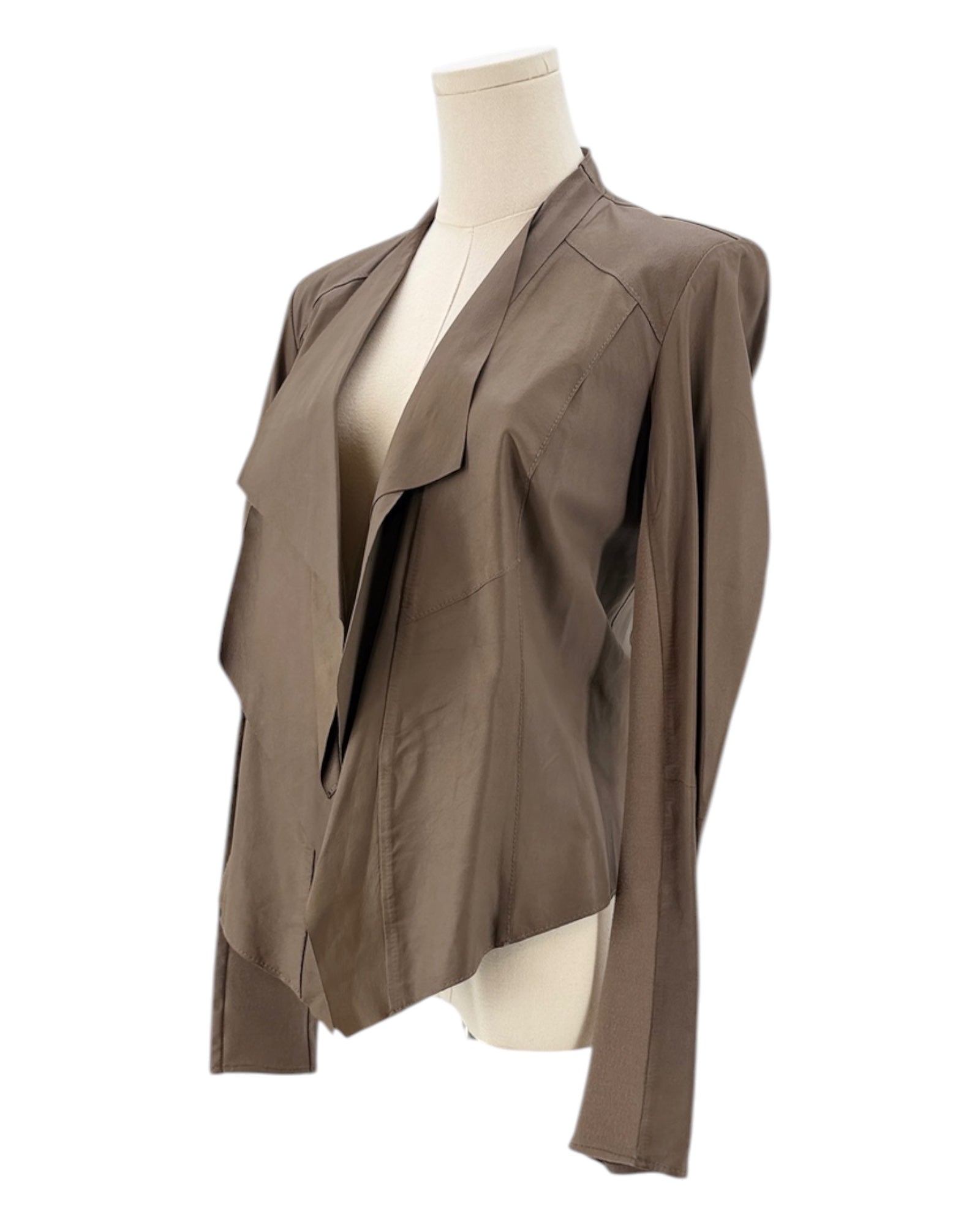 Brown jacket on a mannequin against a white background