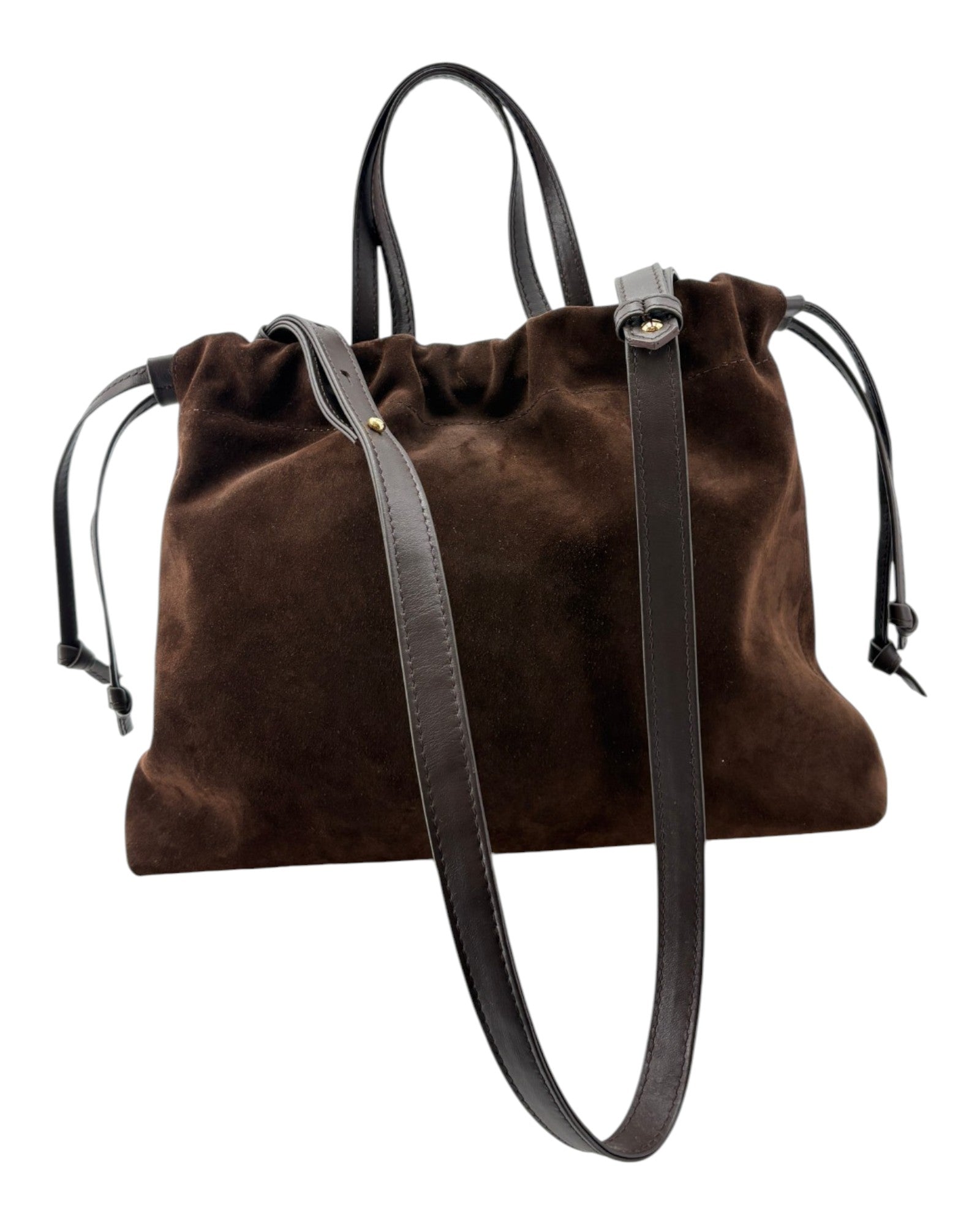 Brown suede handbag with black straps on a white background