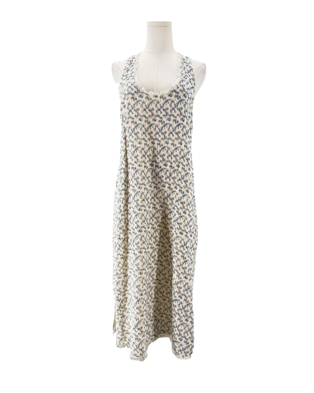 Multi color sleeveless midi dress on a mannequin on a white background