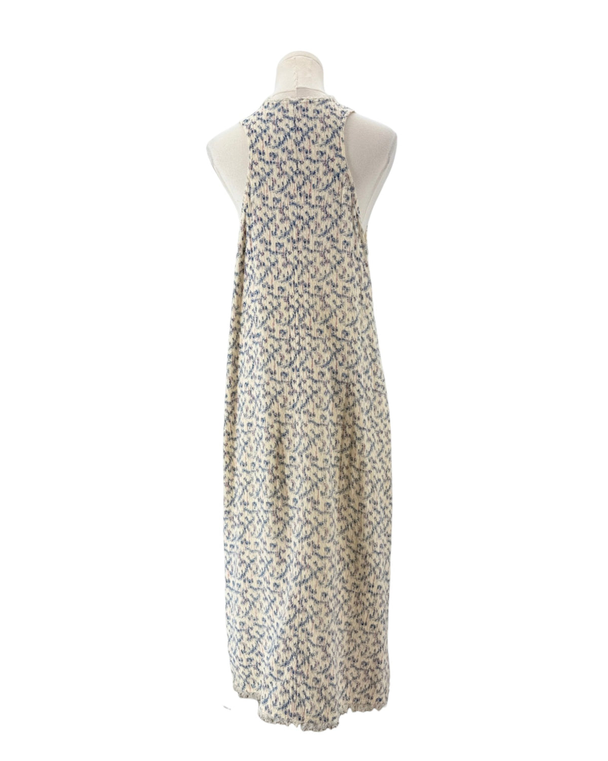 Multi color sleeveless midi dress on a mannequin on a white background