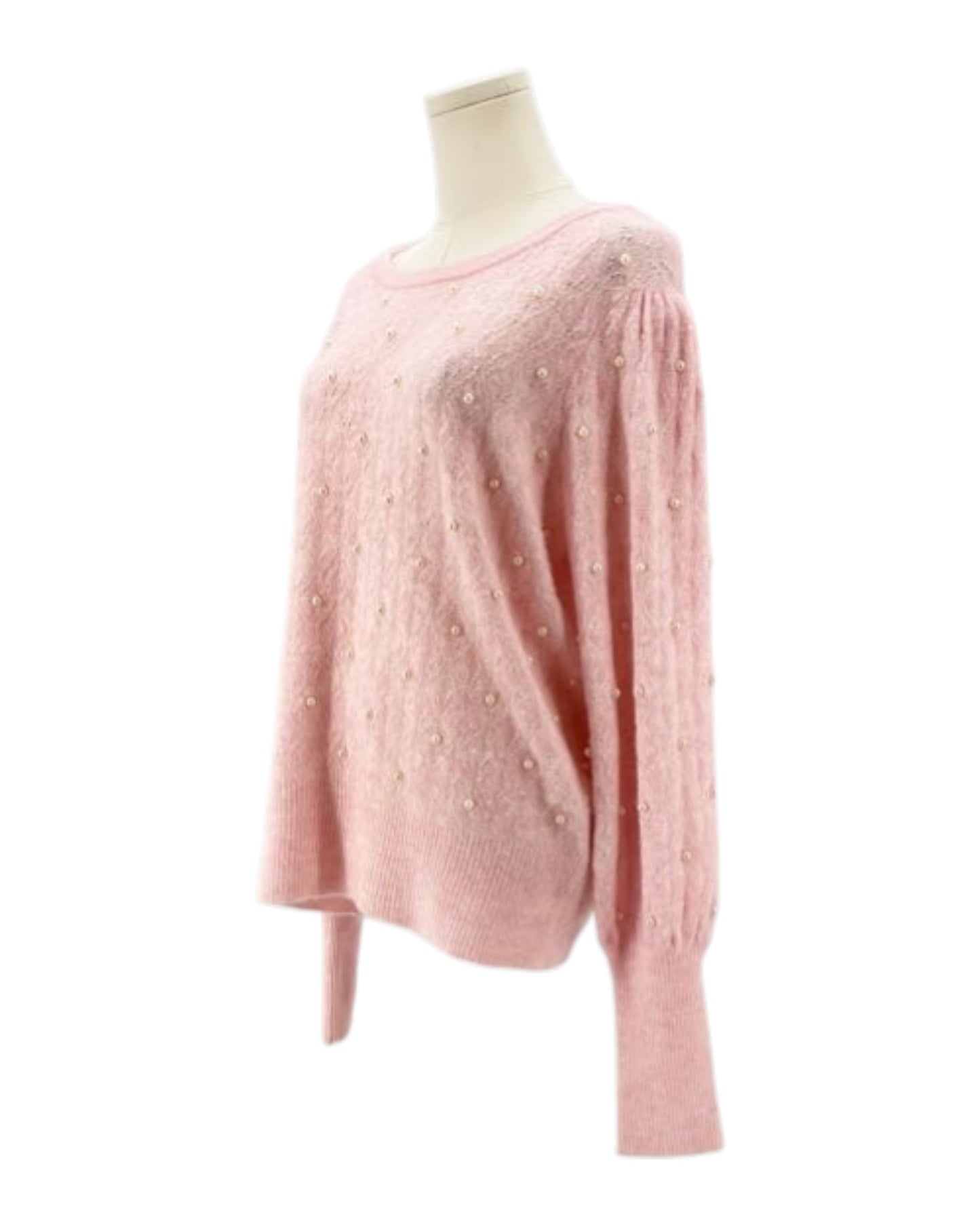 Lily Pulitzer pink sweater with pearl embellishments on a mannequin against a white background