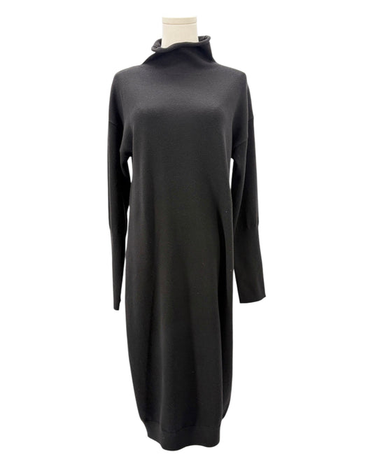 Black sweater dress on a mannequin against a white background