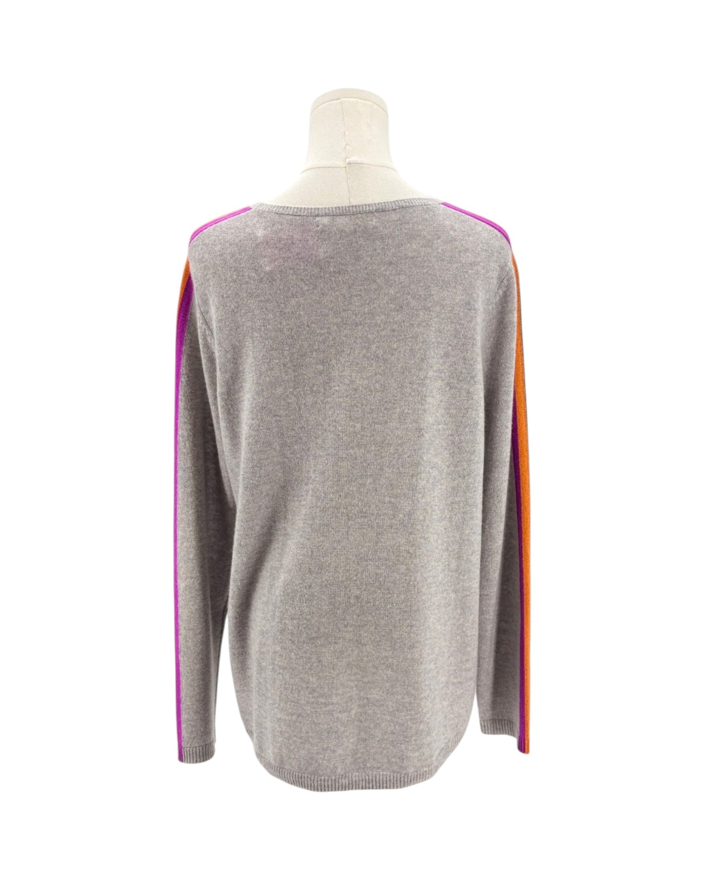 Gray sweater with colorful side panels on a mannequin against a white background