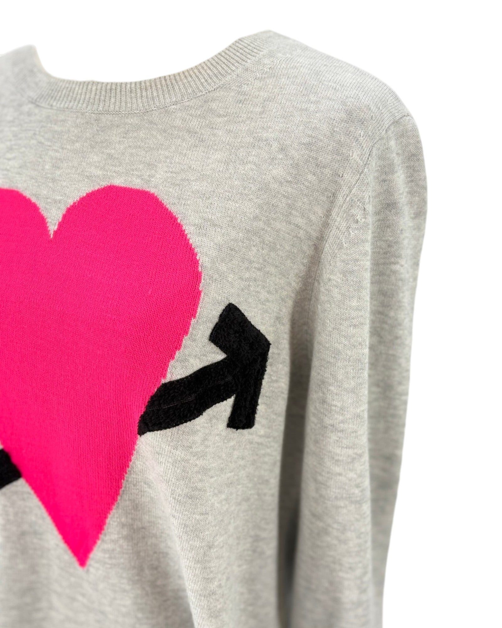 Lisa Todd gray sweater with a pink heart and black arrow on a white background