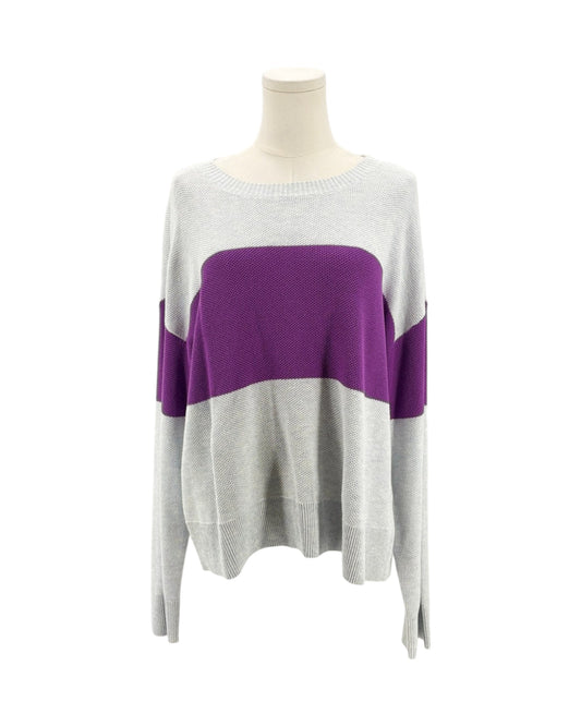Gray sweater with purple accent on a mannequin against a white background