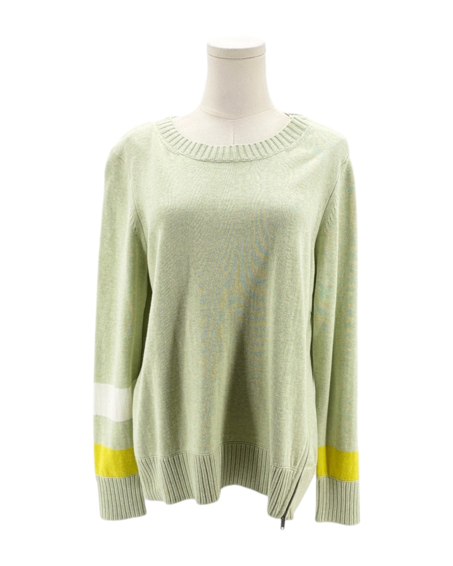 Light green sweater with yellow accents on a mannequin against a white background