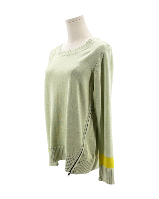 Light green sweater with a yellow accent on a mannequin against a white background