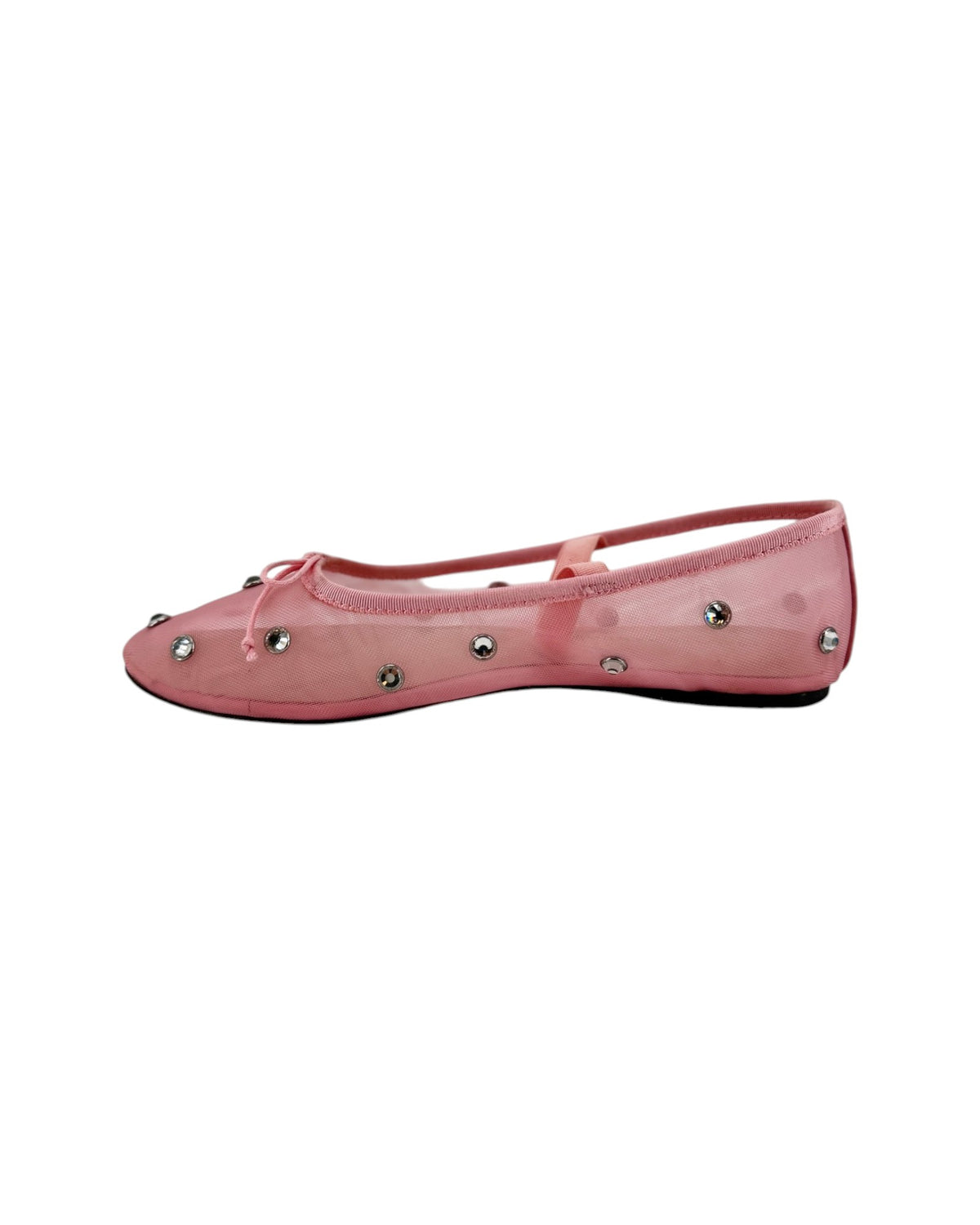 Pink ballet flats with attached jewels and an elastic strap across the top on a white bacground