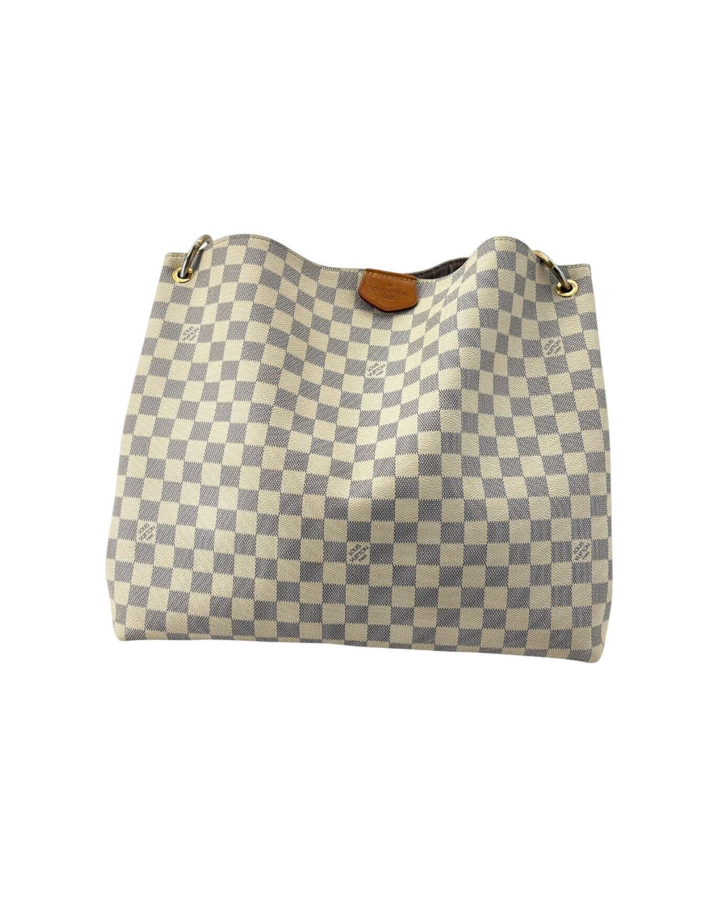 Checkered handbag with brown leather zipper on a white background