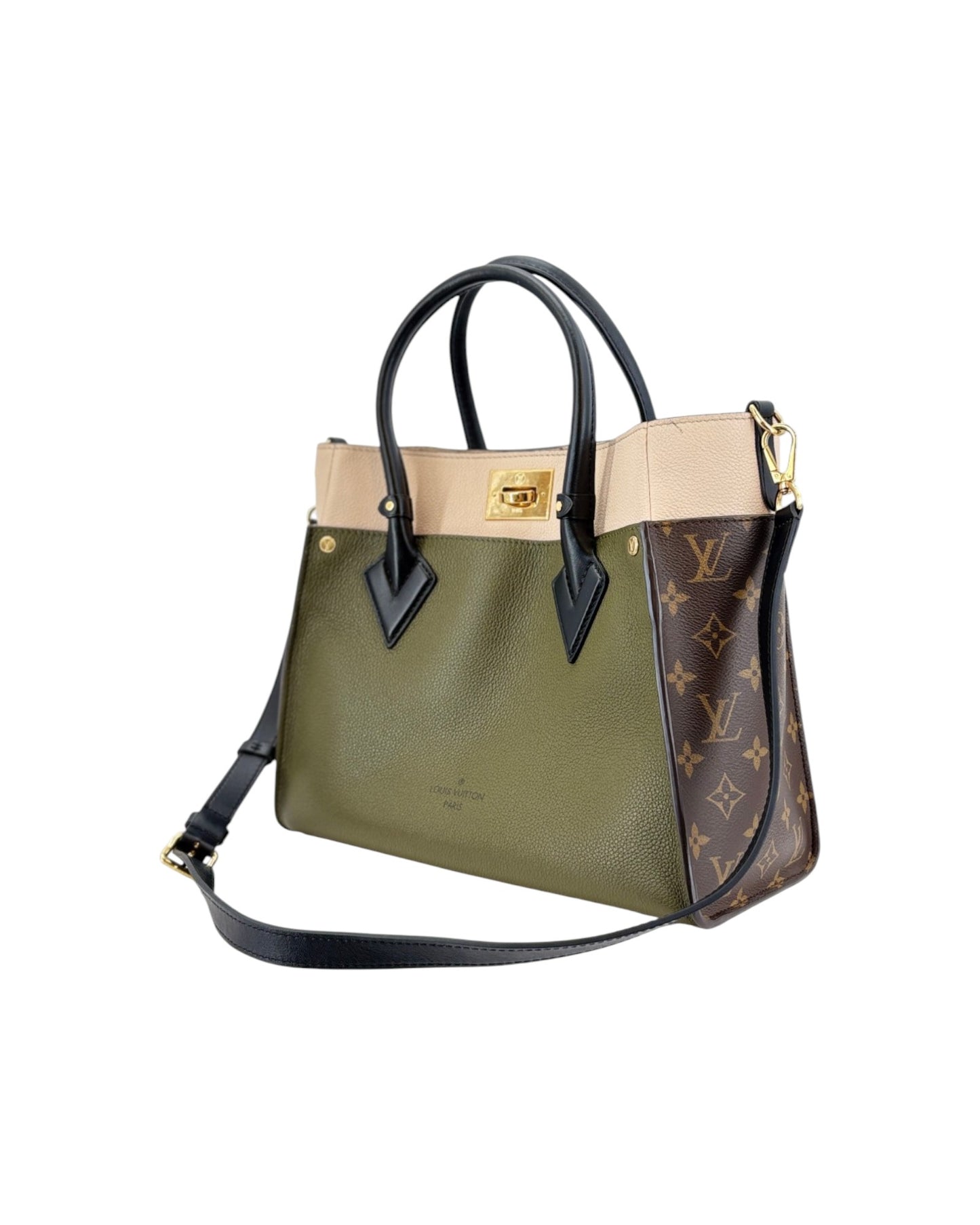 Designer handbag with green body and patterned side section on a white background