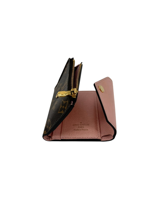Pink and brown Louis Vuitton Wallet on white background