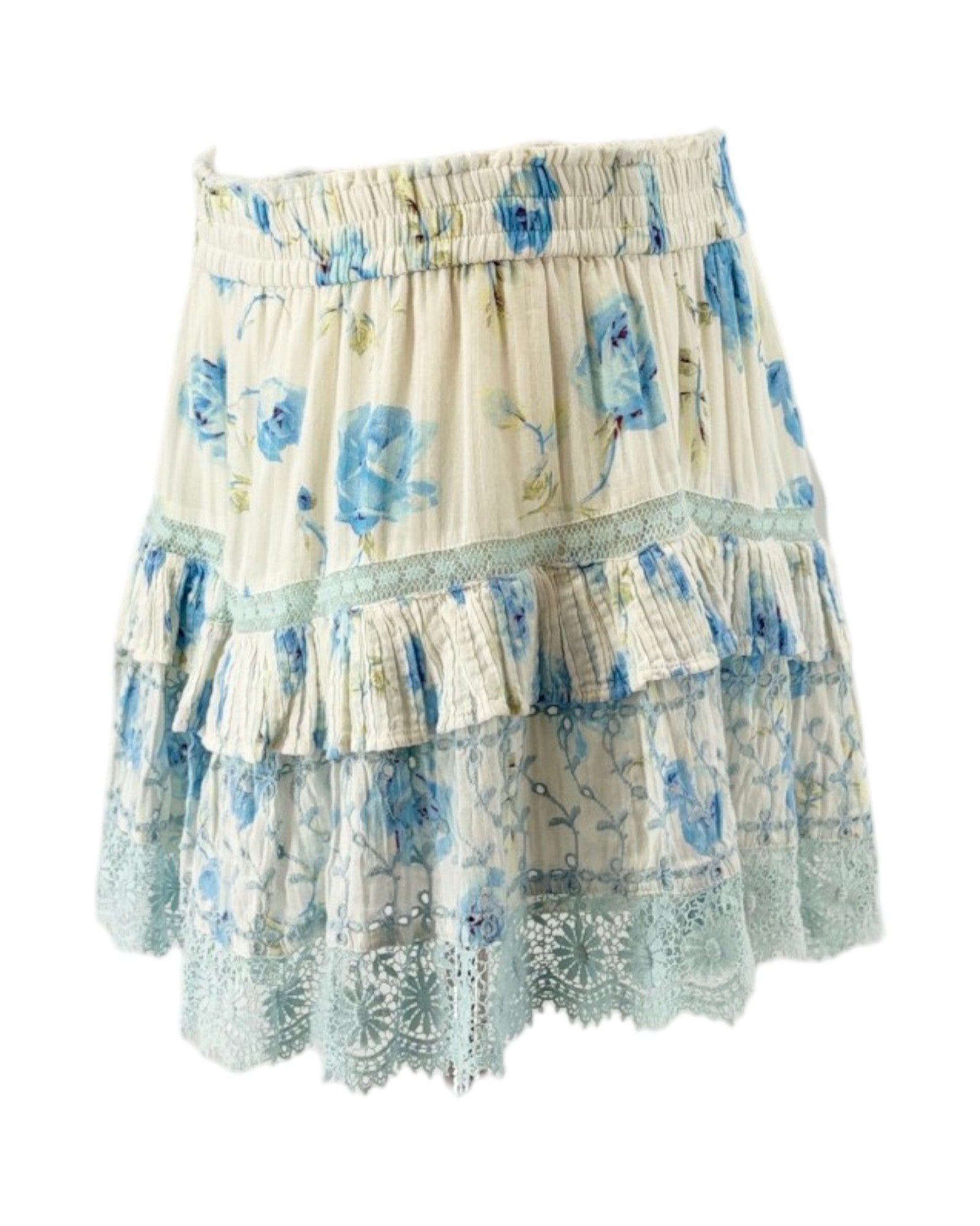 Loveshackfancy floral tiered mini skirt with blue flowers on a white background