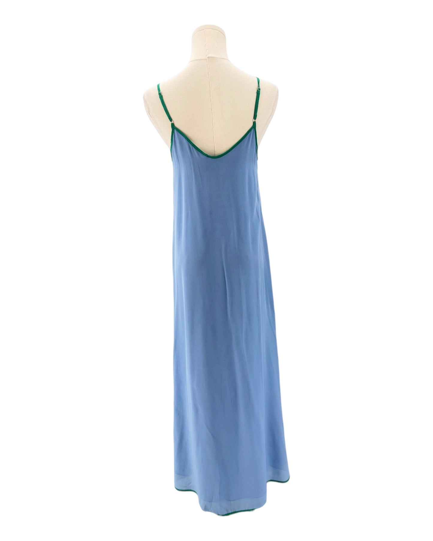 Blue slip dress on a mannequin against a white background