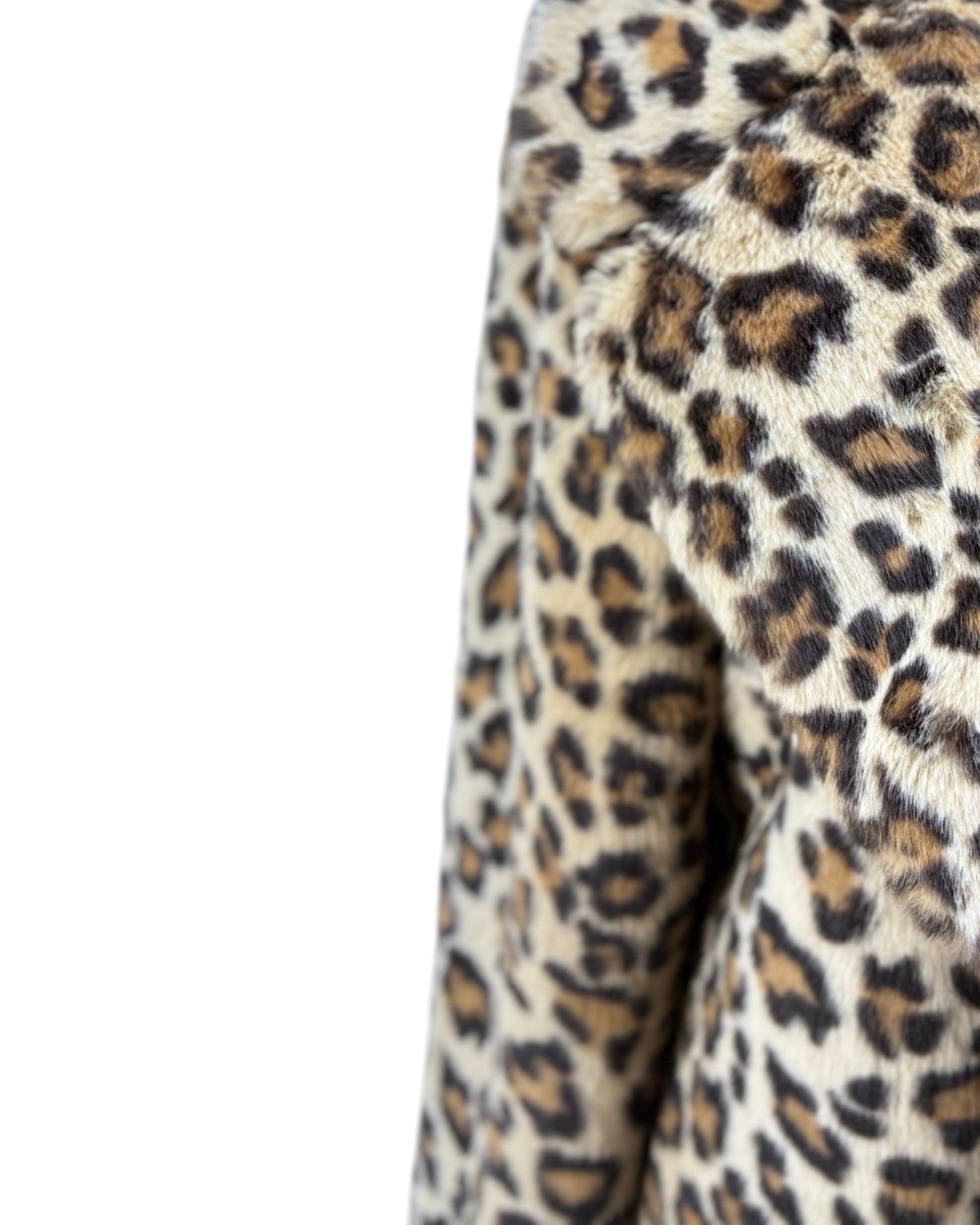 Close-up of a leopard print fabric on a white background