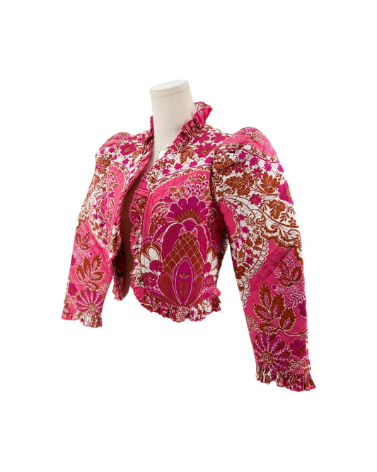 Long sleeve floral pink quilted jacket with ruffle trim on a white background