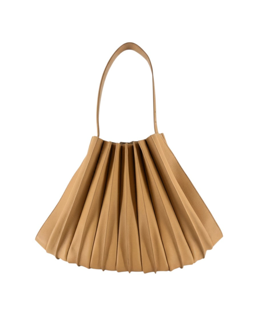 Tan pleated leather handbag on a white background