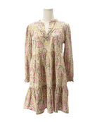 Floral patterned dress on a mannequin against a white background