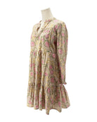 Floral dress on a mannequin against a white background