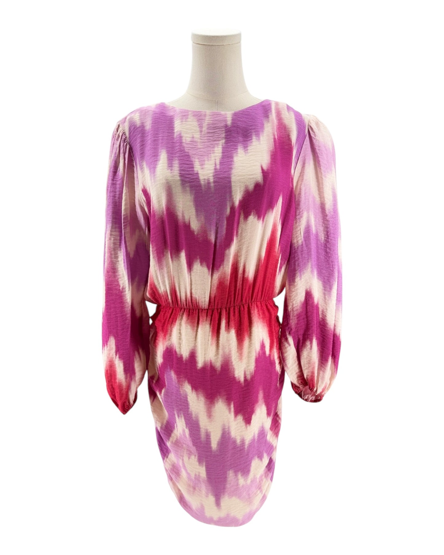 Mannequin wearing a pink and white tie-dye dress on a white background