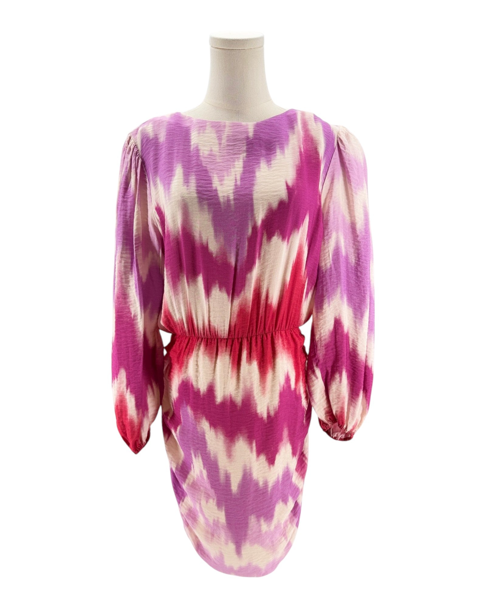Mannequin wearing a pink and white tie-dye dress on a white background