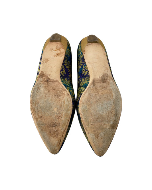 Pair of shoe soles with visible soles on a white background