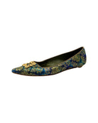 Decorative flat shoe with floral pattern on a white background