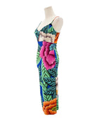 Colorful floral dress on a mannequin against a white background
