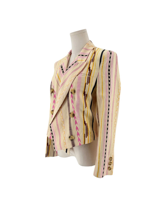 Cream with multi color geometric/tribal print, cropped, classic pointed collar, three front button closure on a mannequin on a white background