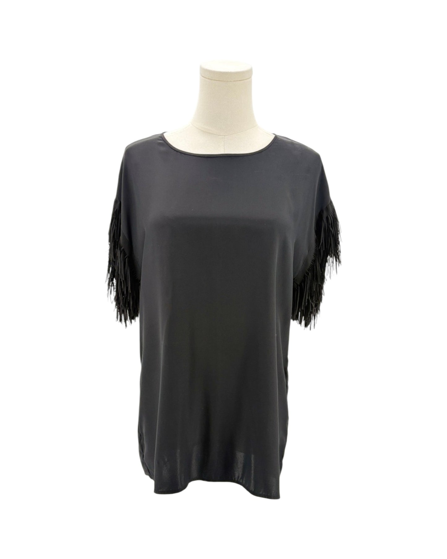 Black fringe top on a mannequin with a white background