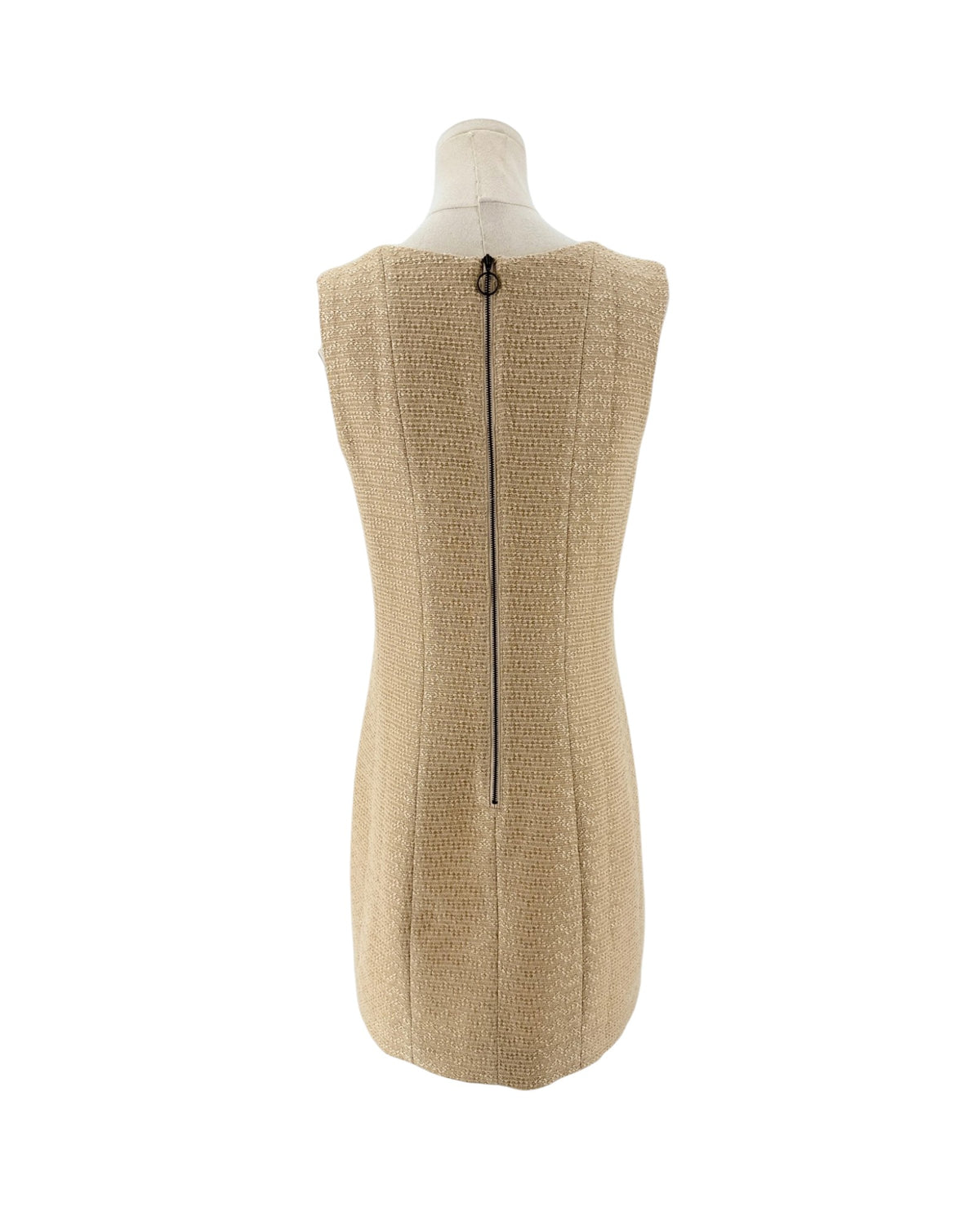 Tweed and metallic sleeveless mini dress with bronze back zipper on a mannequin on a white background