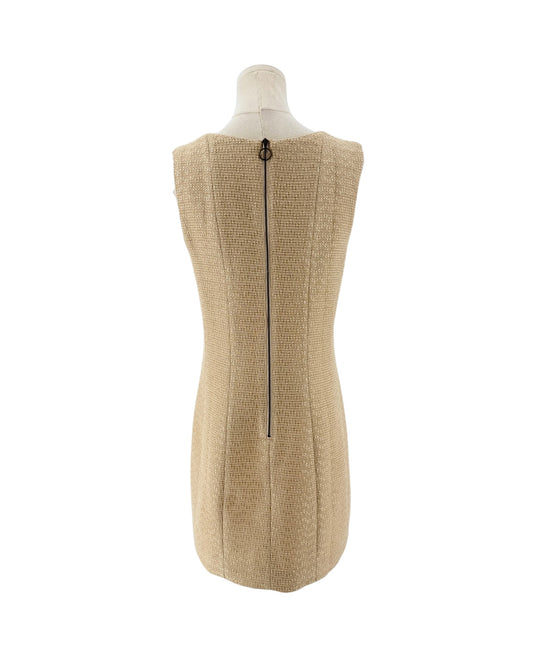 Tweed and metallic sleeveless mini dress with bronze back zipper on a mannequin on a white background