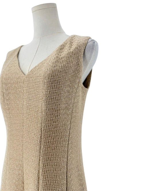 Tweed and metallic sleeveless mini dress on a mannequin on a white background