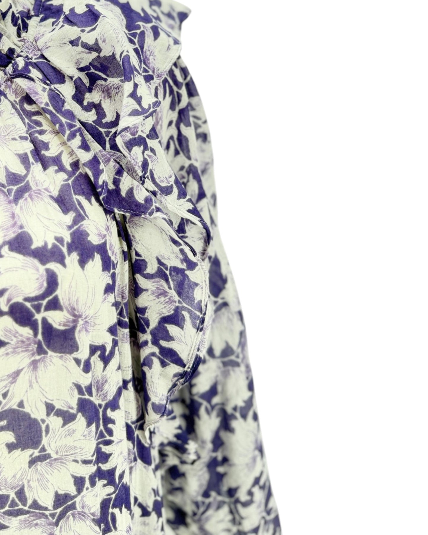 Floral patterned fabric with purple and white flowers on a white background
