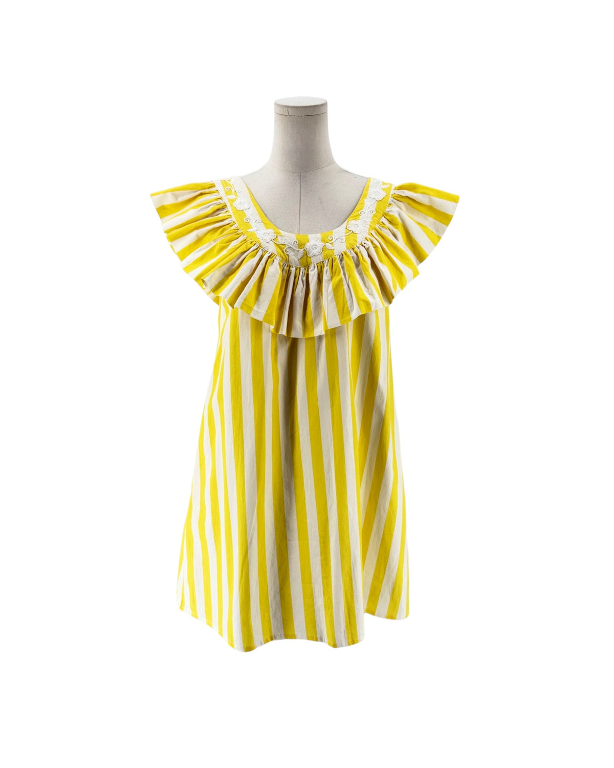Yellow and white striped mini dress with white embroidered flowers along the neckline on a mannequin on a white background