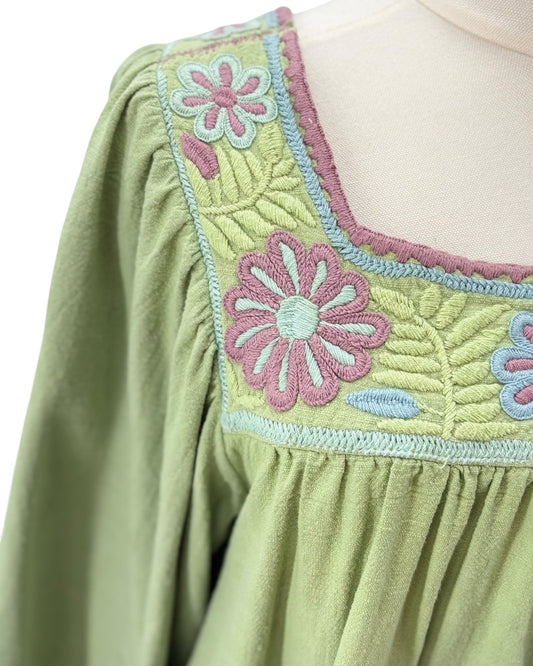 Mi Golondrina green dress with floral embroidery