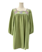 Mi Golondrina green dress with floral embroidery