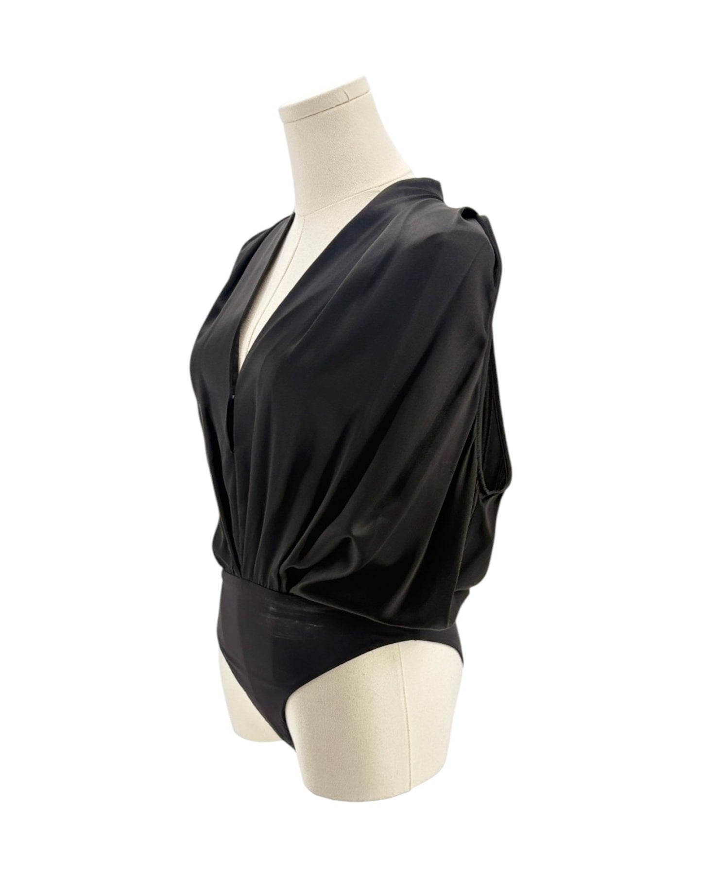 Black silk bodysuit on a mannequin on a white background