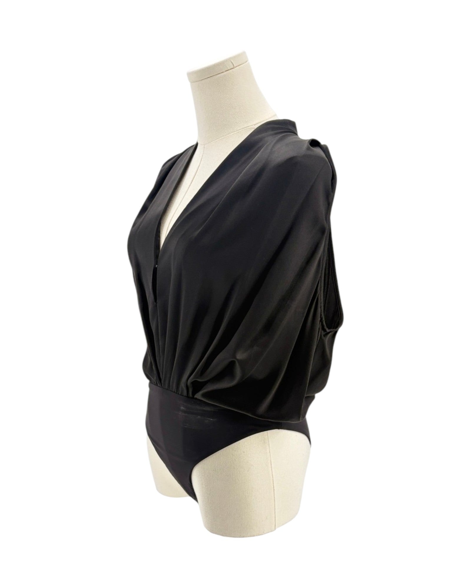 Black silk bodysuit on a mannequin on a white background