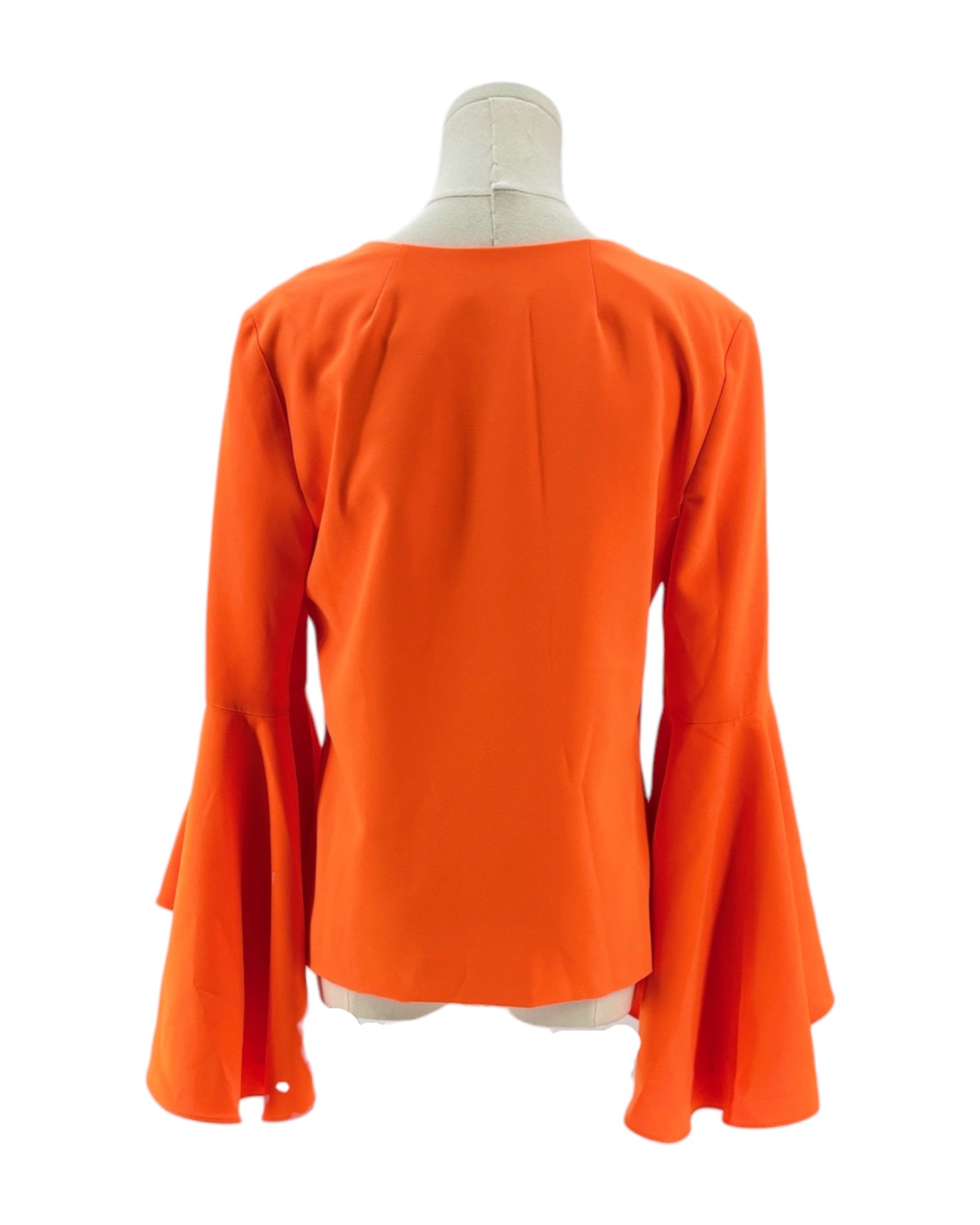 Orange blouse with bell sleeves on a mannequin against a white background