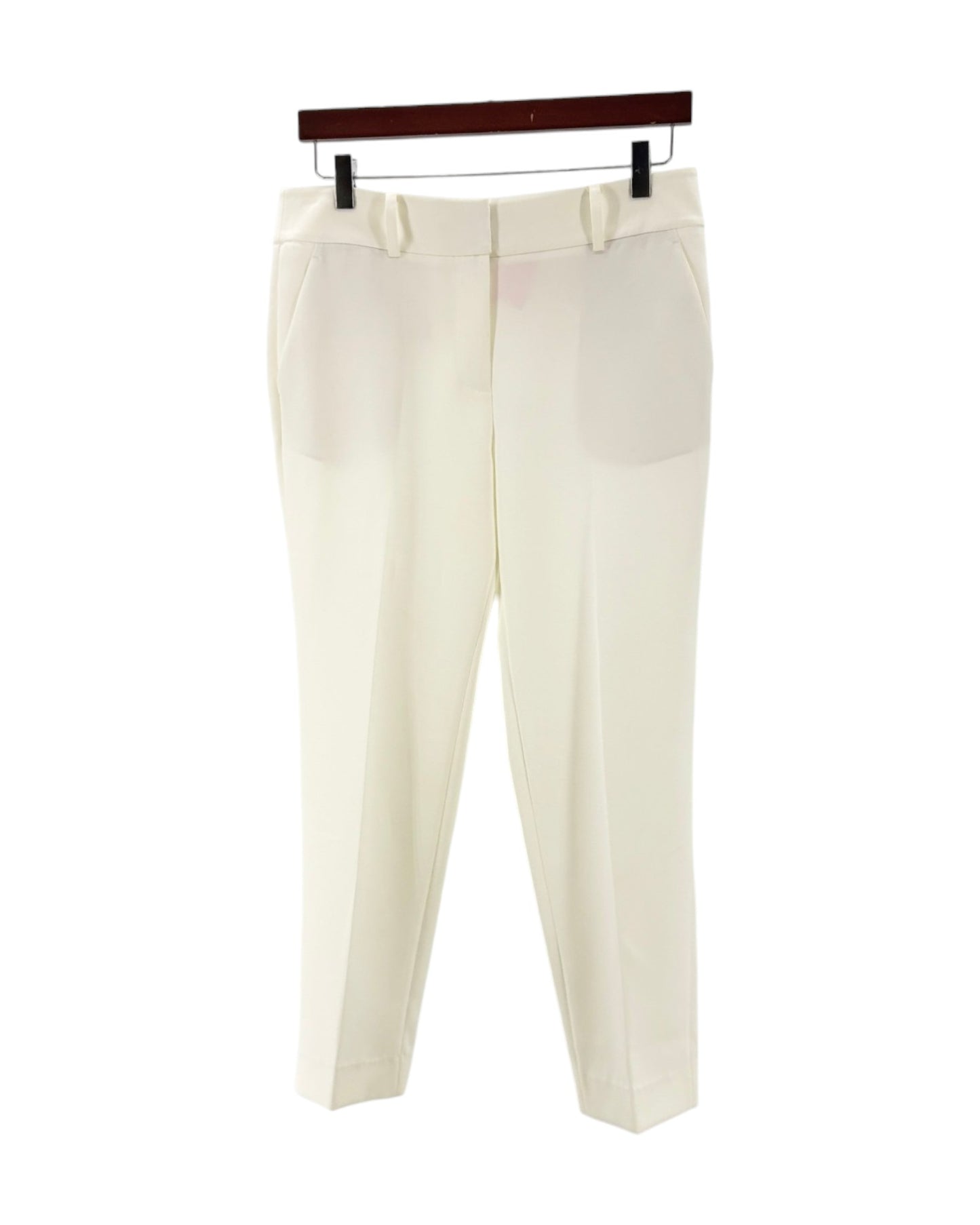 Cream colored trousers on a white background