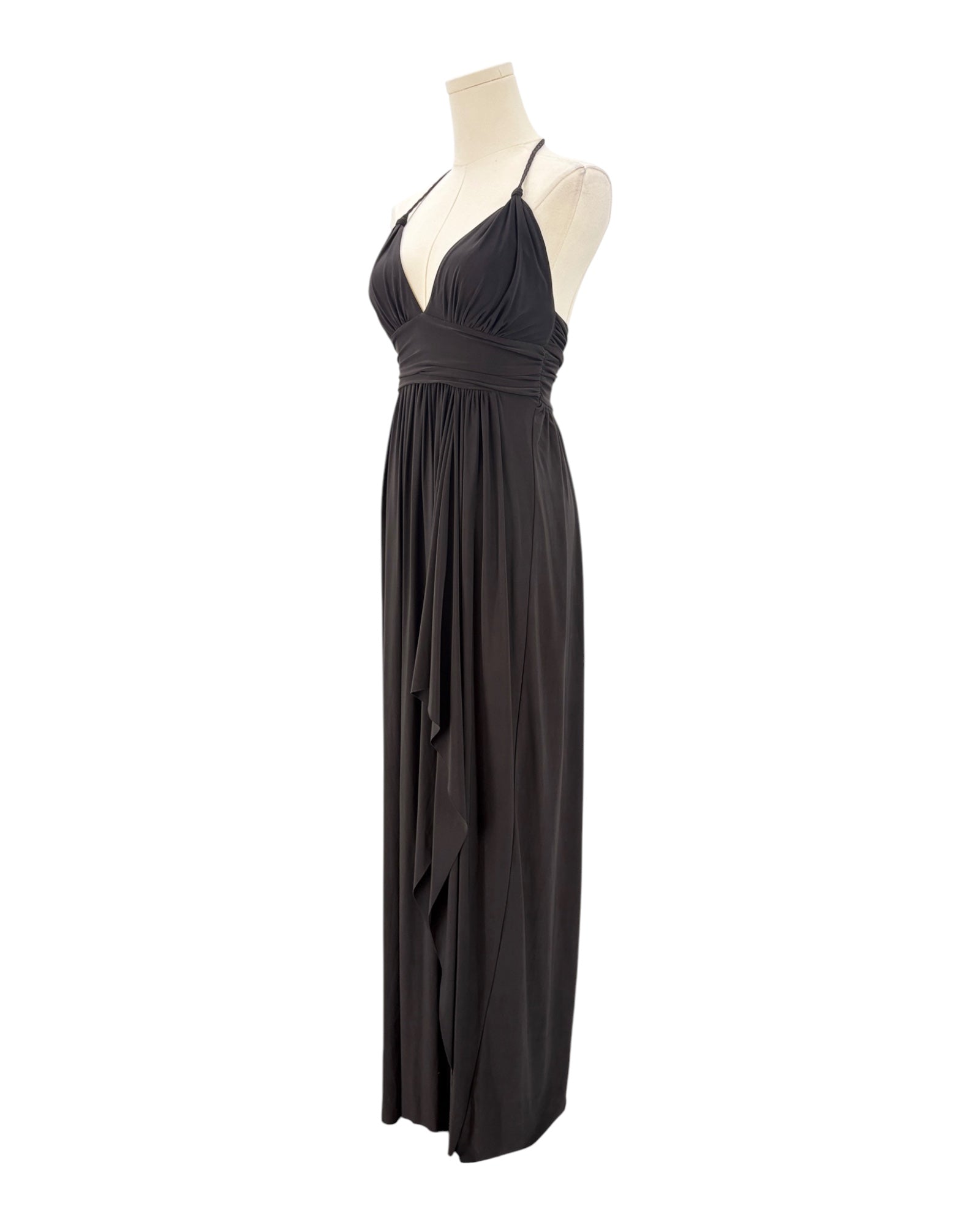 Black halter neck dress on a mannequin against a white background