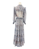 Floral patterned dress on a mannequin against a white background