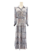 Long patterned dress on a mannequin against a white background